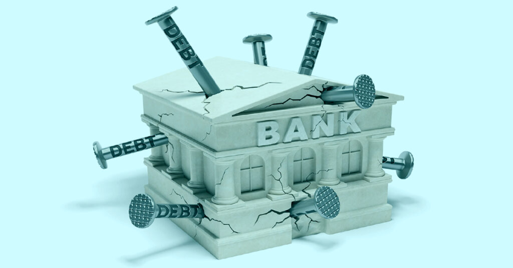 Model of a Bank building with nails hammered into it from all sides
