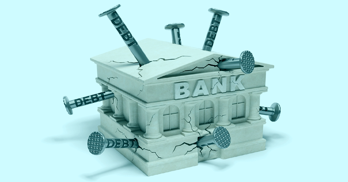 Model of a Bank building with nails hammered into it from all sides