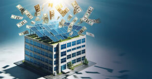 image of commercial building with solar panels on the roof and money falling from the sky