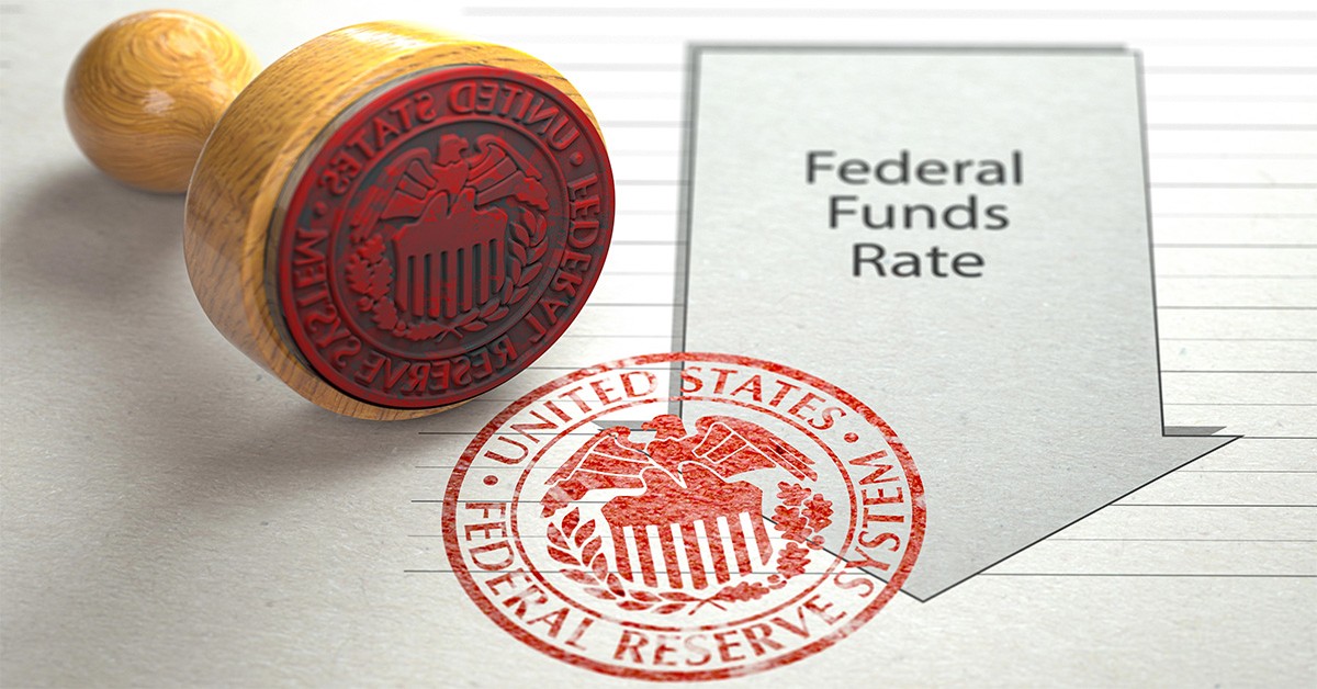 Fed cuts rates, though three officials dissent - Scotsman Guide