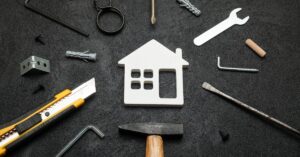 New-home construction stalls as incentives replace starts, policy inertia compounds.