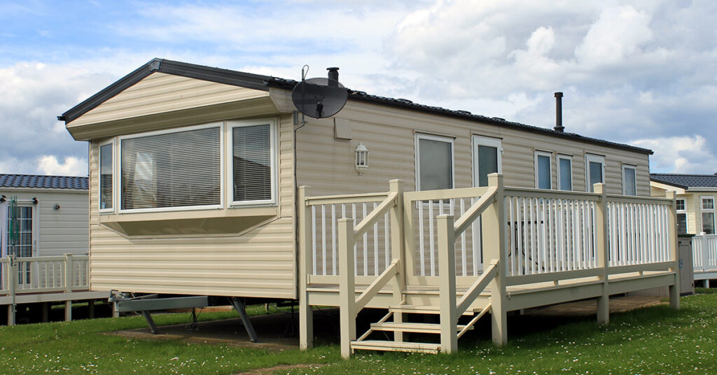 Laws that treat factory-built homes like cars instead of real estate push buyers into costlier "home-only" loans