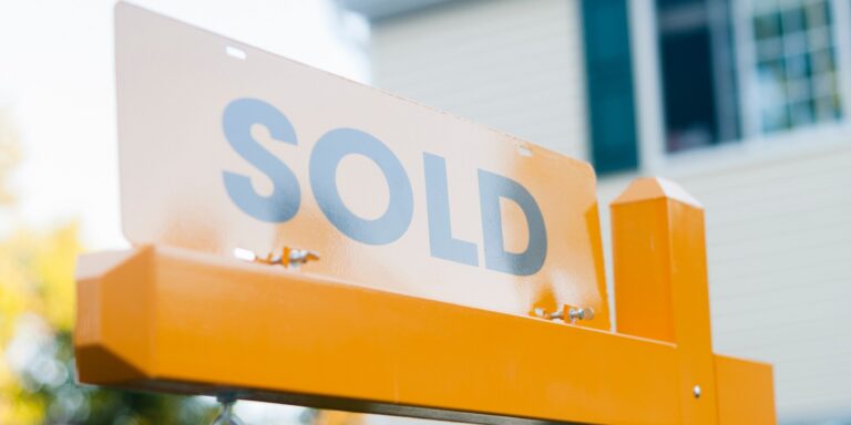 Home prices flat in June, extending cooling trend