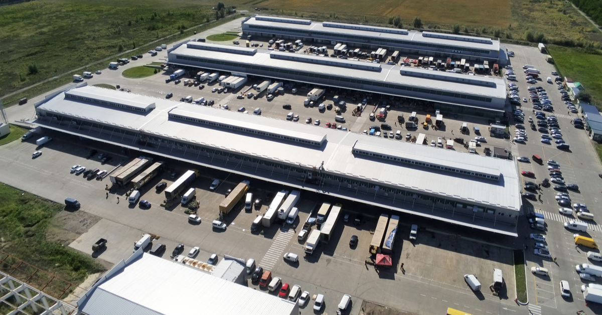 INDUSTRIAL Aerial shot of warehouse with trucks