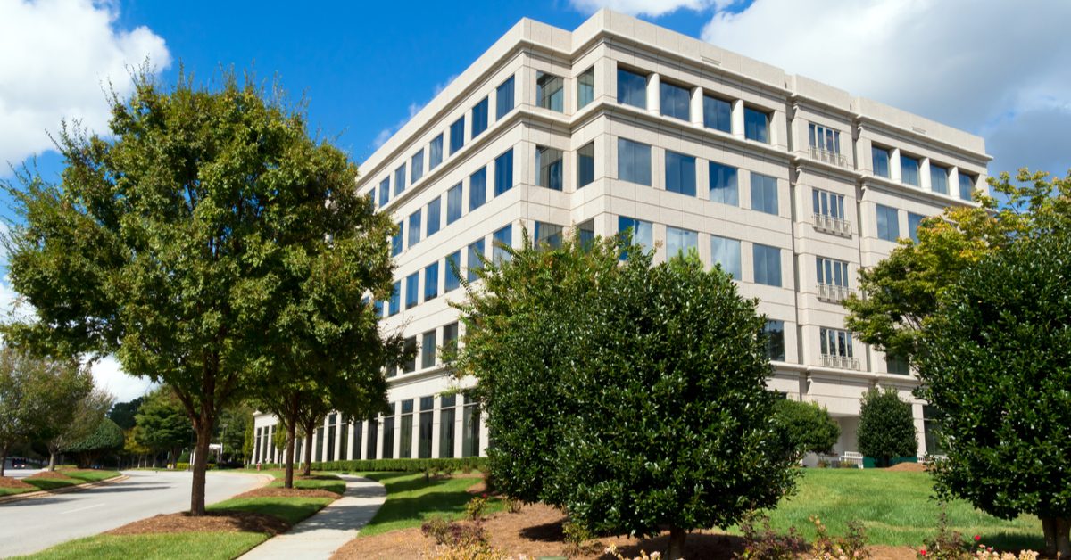 OFFICE Suburban office building in tree-lined setting