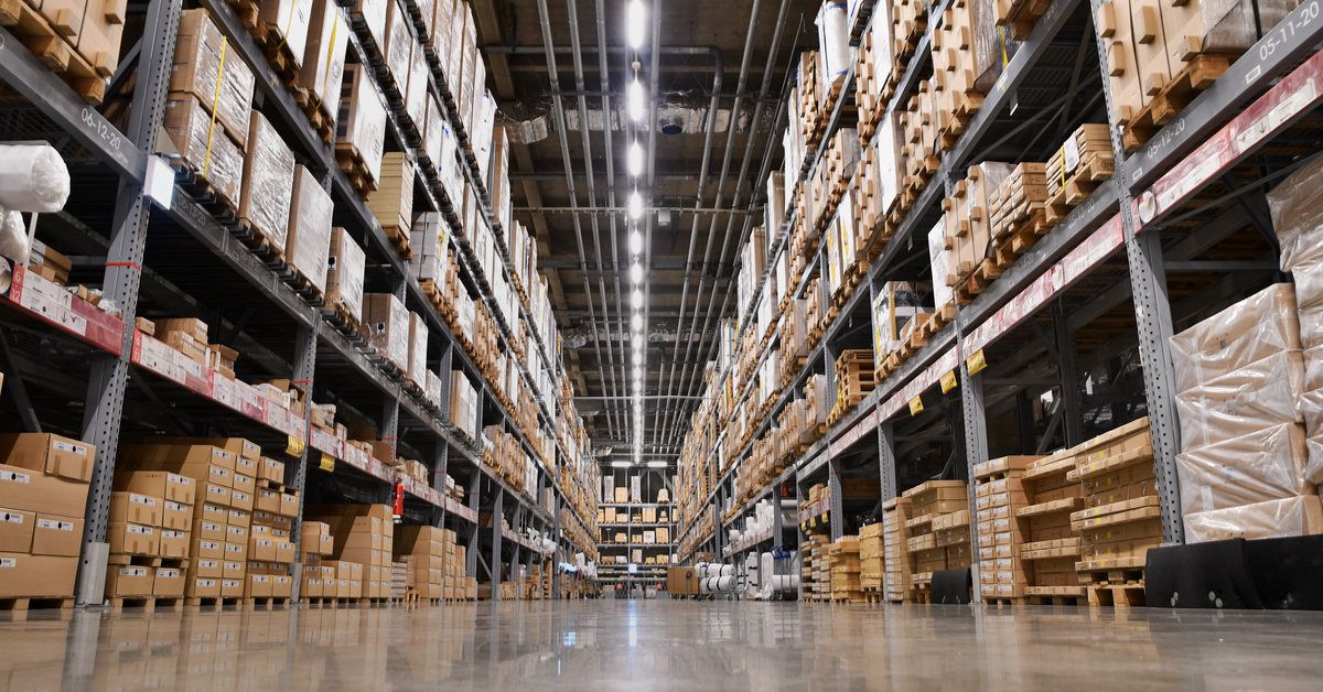 INDUSTRIAL Warehouse interior shot, rows of pallets