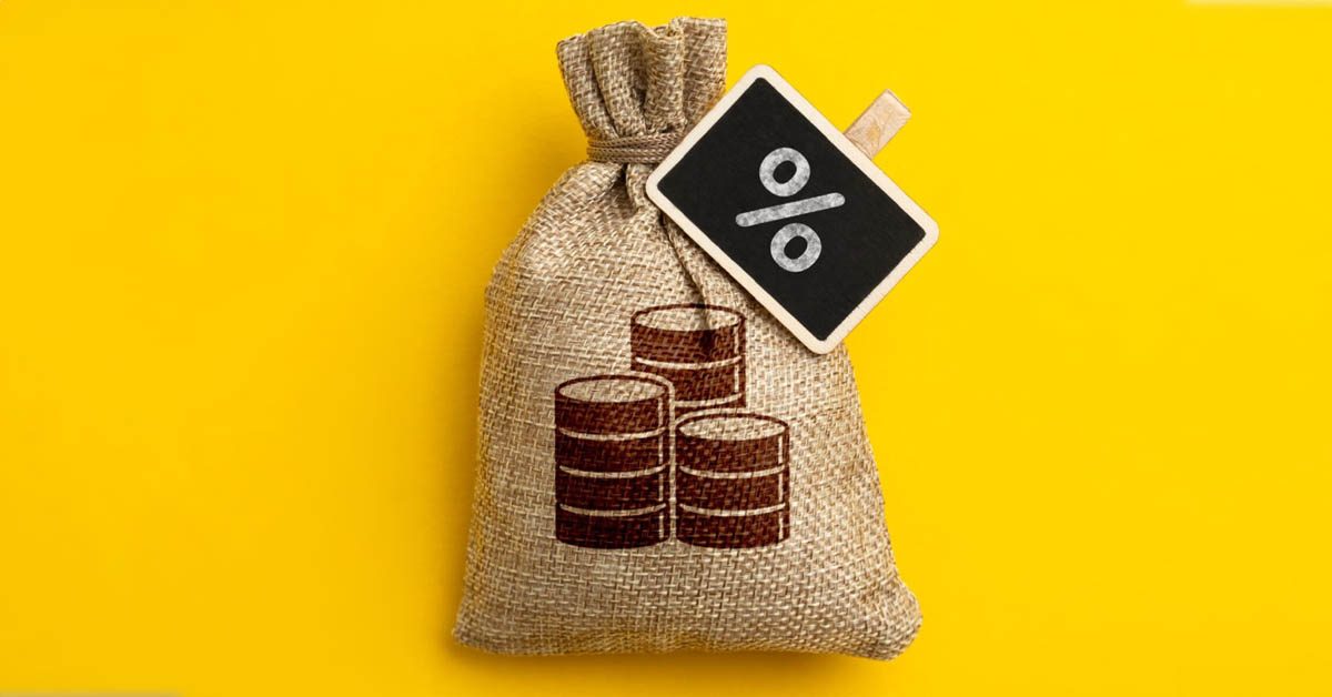 CONCEPT Burlap bag of coins percent sign