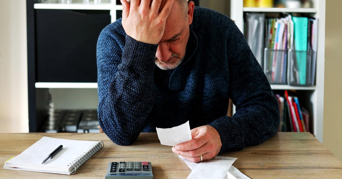 PEOPLE Upset older man calculating costs