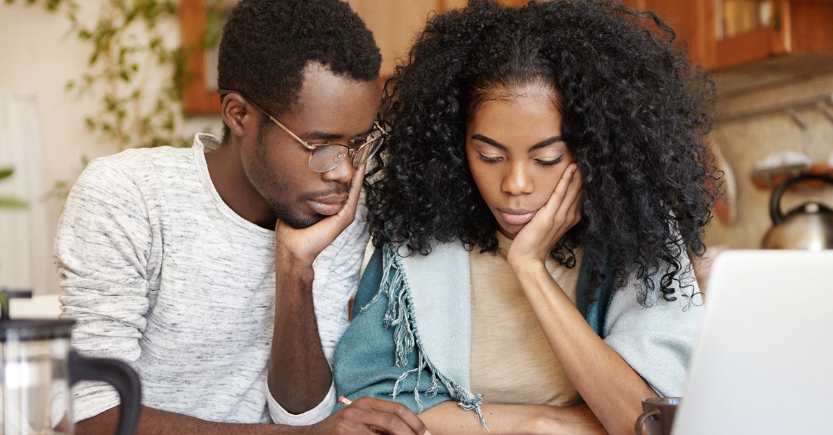 PEOPLE Upset young African-American couple