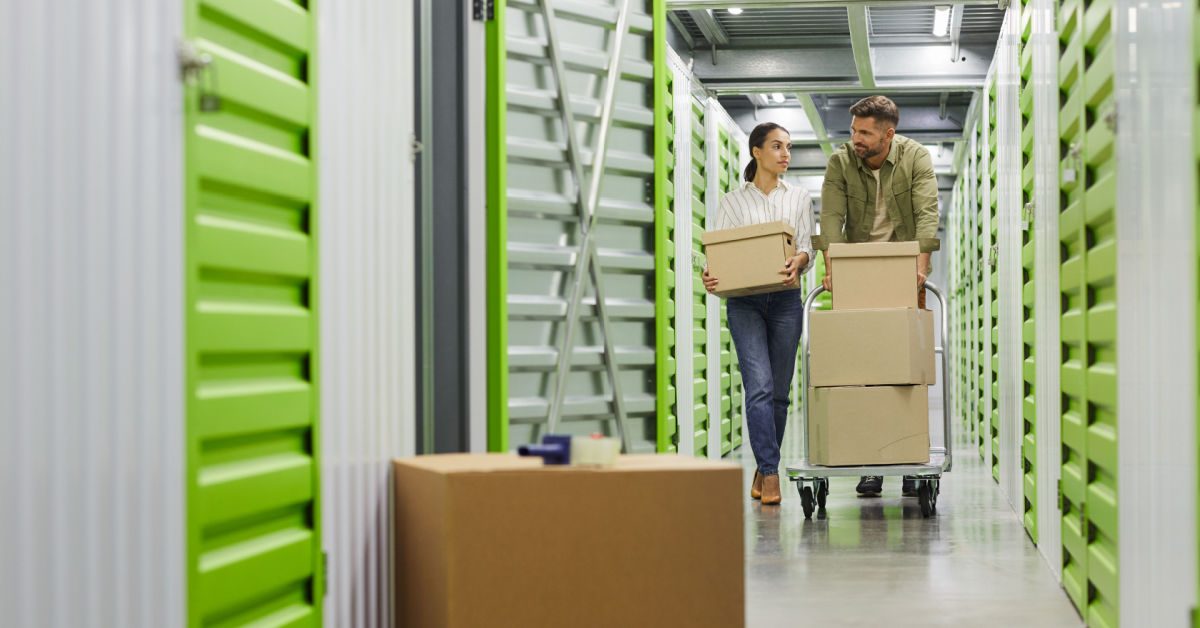 PEOPLE Couple walking through self-storage facility