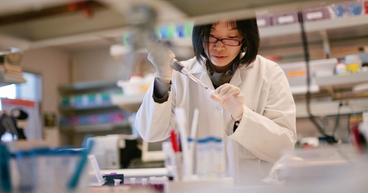 PEOPLE Scientist pipetting at medical lab