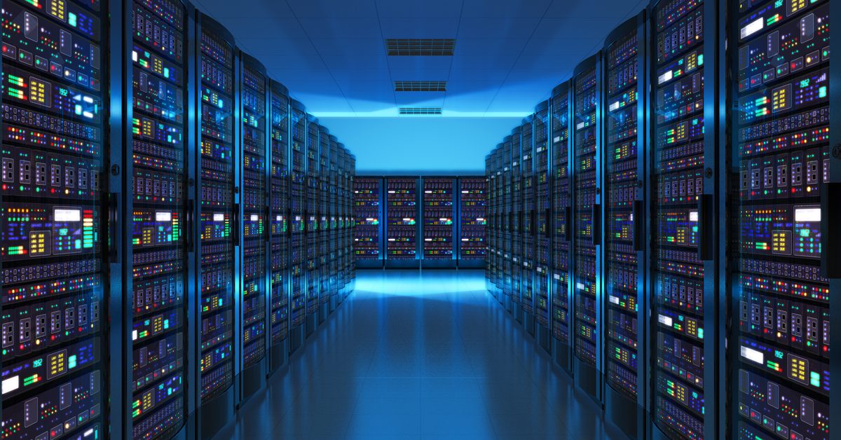 Servers in data center bathed in blue light