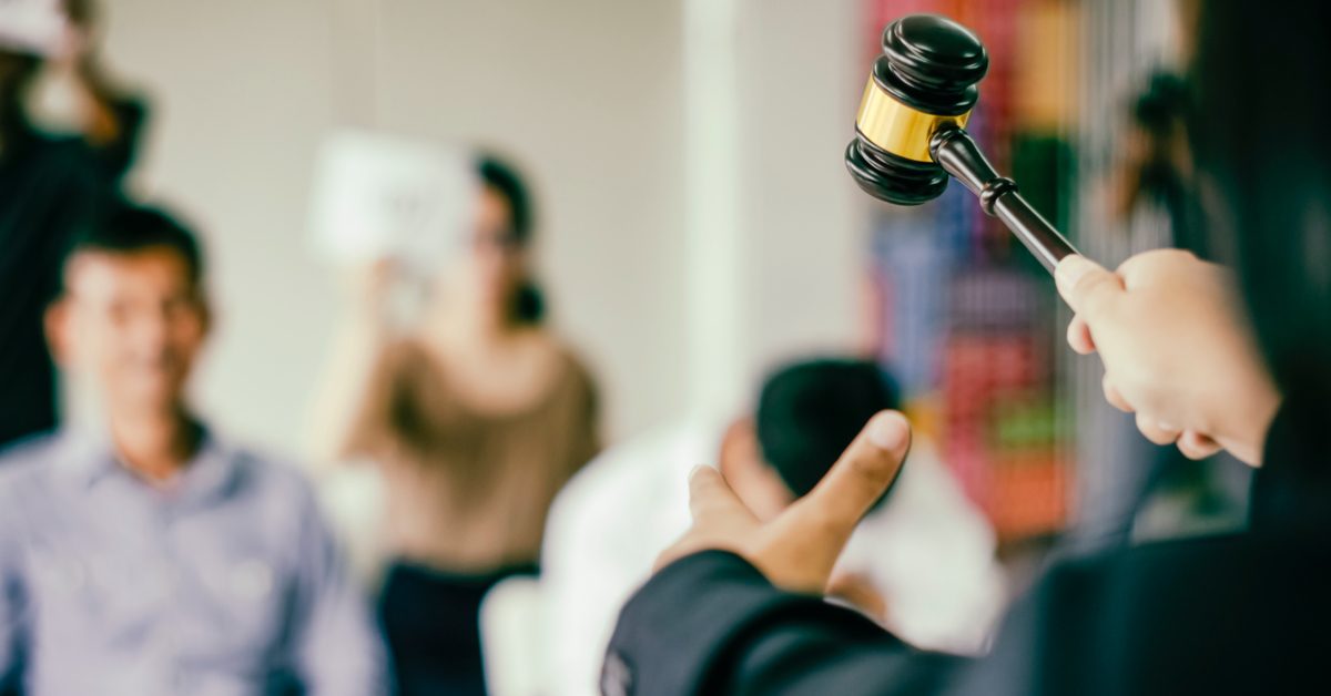 CONCEPT Banging gavel at auction