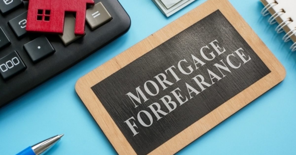 Wooden,Plate,With,Inscription,Mortgage,Forbearance,And,Model,Of,House.